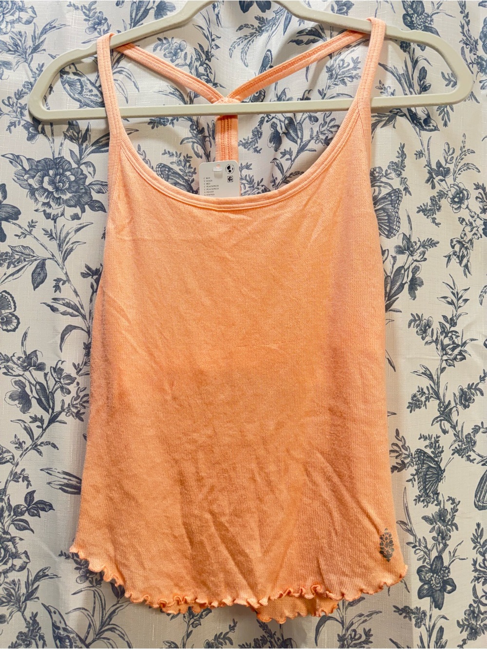 FP Movement by Free People Peach Cross-Back Ruffle Tank